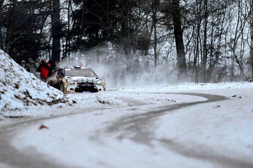 French driver Sebastien Loeb steers his Citro&Atilde;&laquo;n DS3 on January 17, 2013 in Gilhoc, southeastern France