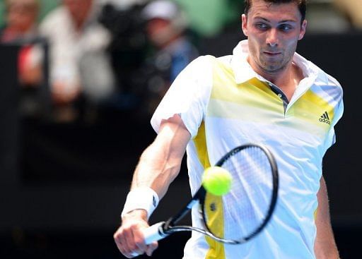 Germany&#039;s Daniel Brands during his Australian Open match against Australia&#039;s Bernard Tomic on January 17, 2013