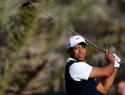 Tiger Woods plays a shot during the first round of the Abu Dhabi Golf Championship on January 17, 2013