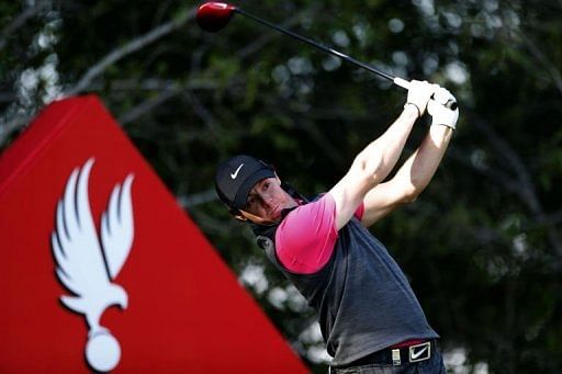 Northern Ireland&#039;s Rory McIlroy plays a shot during the first round of the Abu Dhabi Championship on January 17, 2013
