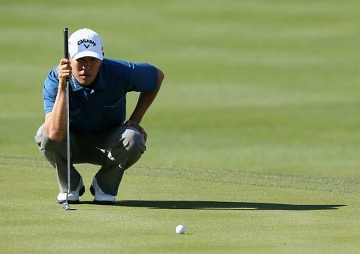 James Hahn lines up a putt on the 14th green on January 18, 2013 in La Quinta, California