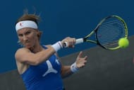 Svetlana Kuznetsova hits a return to Carla Suarez Navarro, in Melbourne, on January 19, 2013