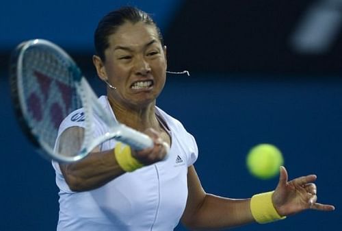 Kimiko Date-Krumm plays a return to Bojana Jovanovski in the Australian Open in Melbourne on January 19, 2013