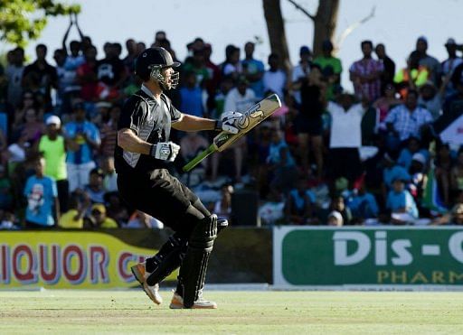 New Zealand&#039;s James Franklin celebrates after hitting the four against South Africa on January 19, 2013