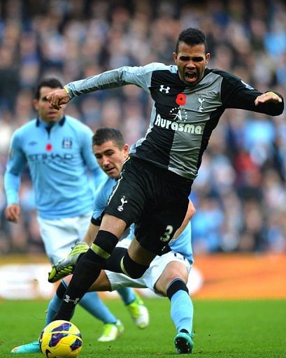 Sandro gets away from Manchester City defender Aleksandar Kolarov during a clash on November 11, 2012