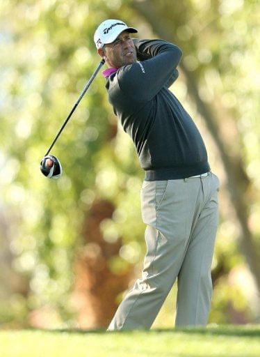 Stewart Cink hits his tee shot on the second hole, in La Quinta, California, on January 19, 2013