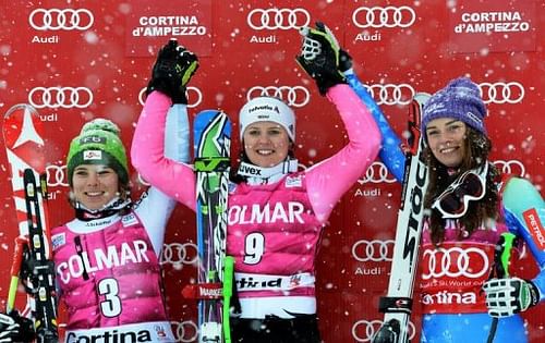 (From L) Nicole Schmidhof, Viktoria Rebensburg and Tina Maze on the podium in Cortina d'Ampezzo, Italy, January 20, 2013