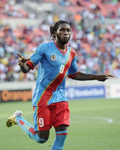 Democratic Republic of Congo&#039;s Dieudonne Mbokani celebrates after scoring in Port Elizabeth on January 20, 2013
