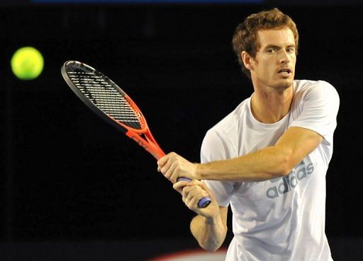 Andy Murray hits a return during a training session in Melbourne, on January 13, 2013