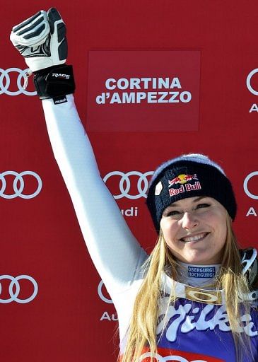 Lindsey Vonn celebrates after winning the women&#039;s downhill world cup in Cortina d&#039;Ampezzo on January 19, 2013