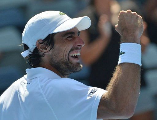 Jeremy Chardy celebrates after defeating Andreas Seppi, in Melbourne, on January 21, 2013