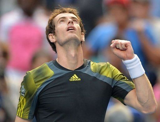 Andy Murray celebrates after victory in his match against Gilles Simon at the Australian Open on January 21, 2013
