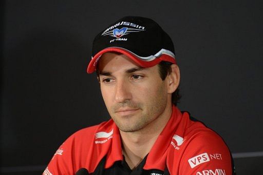 Timo Glock sits during a press conference at the Hockenheimring circuit on July 19, 2012