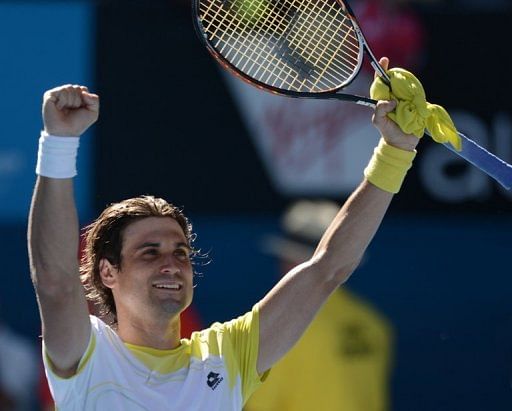 David Ferrer celebrates after defeating Nicolas Almagro to reach the Australian Open semi-finals on January 22, 2013