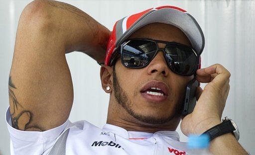 British Formula 1 driver Lewis Hamilton of McLaren relaxes on November 22, 2012 in Sao Paulo, Brazil