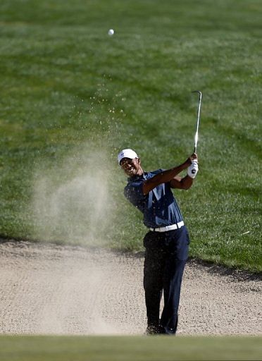 Tiger Woods plays a shot during the second round of the Abu Dhabi Golf Championship on January 18, 2013