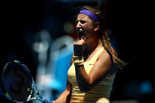 Victoria Azarenka celebrates beating Svetlana Kuznetsova at the Australian Open in Melbourne on January 23, 2013