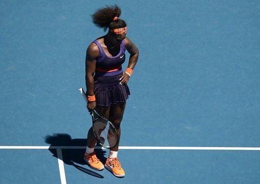 Serena Williams cuts a frustrated figure after losing a point at the Australian Open in Melbourne on January 23, 2013