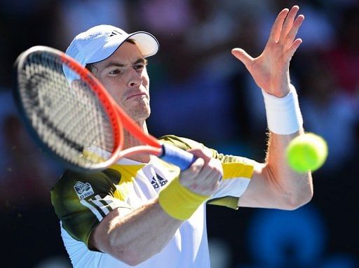 Andy Murray hits a return against Jeremy Chardy during their match at the Australian Open on January 23, 2013