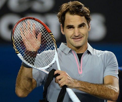 Roger Federer celebrates his victory over Jo-Wilfried Tsonga in Melbourne, on January 23, 2013