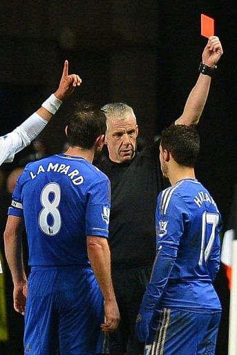 Chelsea&#039;s Eden Hazard (R) is sent off by referee Chris Foy (C) in Cardiff, south Wales on January 23, 2013