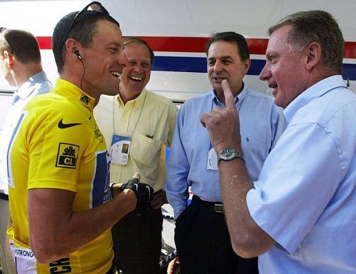 Lance Armstrong (far left), ASO president Patrice Clerc, IOC president Jacques Rogge, the 2002 Tour de France, 24 July
