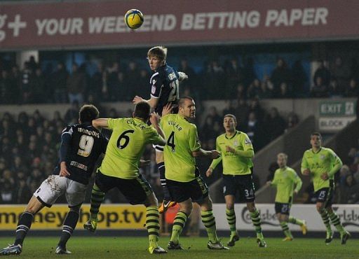 Aston Villa&#039;s Irish striker Andy Keogh (C) heads the ball on January 25, 2013