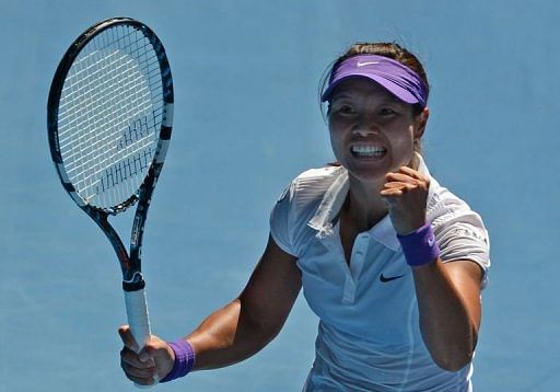 Li Na celebrates her win in the women&#039;s singles semi-final  against Maria Sharapova on January 24, 2013