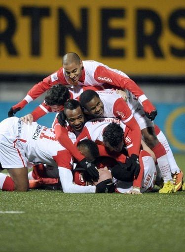 Nancy&#039;s players celebrate after scoring against Lorient on January 26, 2013 in Tomblaine
