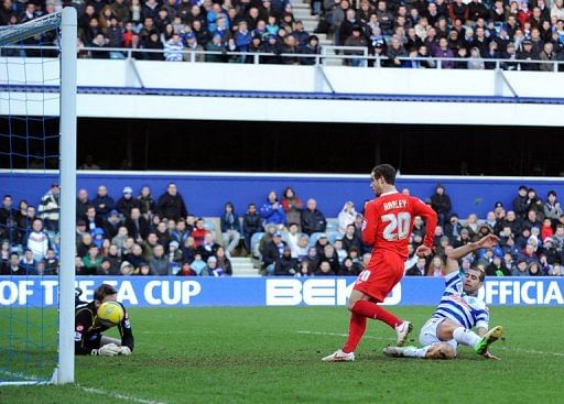MK Dons&#039; Ryan Harley scores against Queens Park Rangers on January 26, 2013