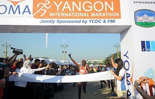 Kenya&#039;s Gitau Kariuki, 25, won the Yangon International Marathon in the time of 2h 19min and 10sec, on January 27, 2013