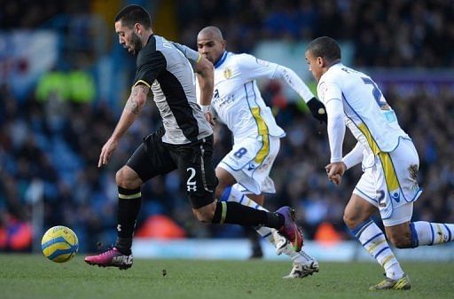 Tottenham Hotspur&#039;s Clint Dempsey (left) Leeds United&#039;s  Rodolph Austin and Lee Peltier at in Leeds January 27, 2013