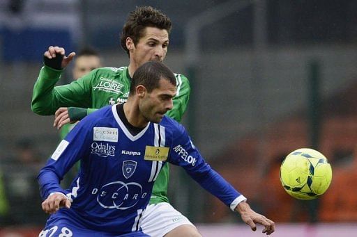 Bastia&#039;s Araujo Ilan (foreground) vies with Saint-Etienne&#039;s Jeremy Clement on January 27, 2013 in Saint-Etienne