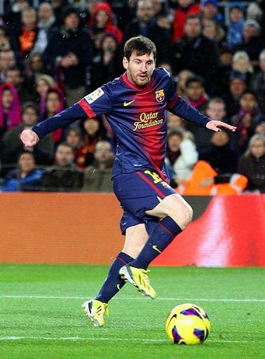 Barcelona&#039;s Lionel Messi scores in Barcelona on January 27, 2013