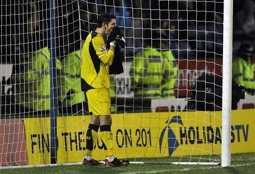 Liverpool&#039;s Australian goalkeeper Brad Jones had a torrid time in the FA Cup at Oldham Athletic on January 27, 2013