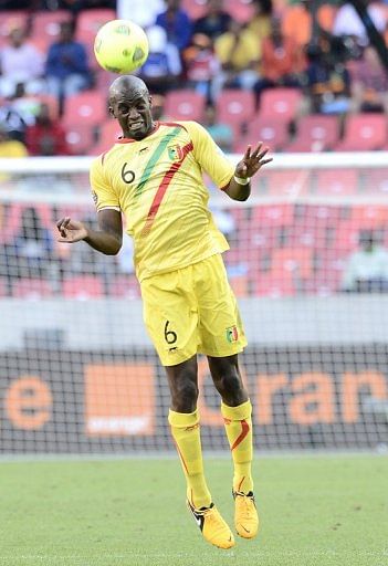 Mali midfielder Momo Sissoko heads the ball during their Africa Cup of Nations match against Ghana on January 24, 2013