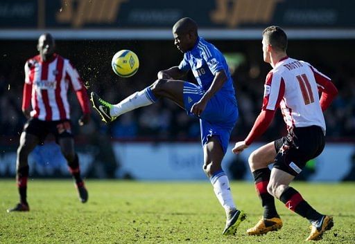 Chelsea&#039;s Ramires (C) and Brentford&#039;s Marcello Trotta (R) during their FA Cup fourth-round match on January 27, 2013