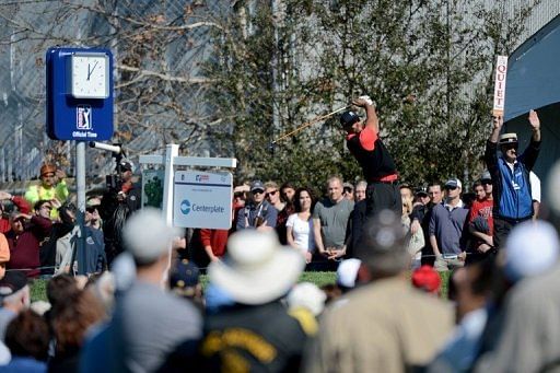 Tiger Woods hits off the 10th tee during the final round at the Farmers Insurance Open on January 28, 2013