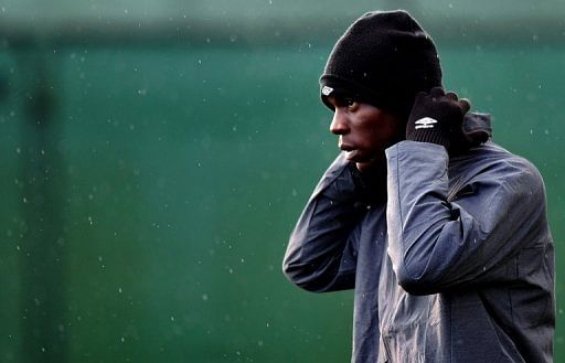 Manchester City&#039;s Italian forward Mario Balotelli arrives for a training session in Manchester on December 3, 2012
