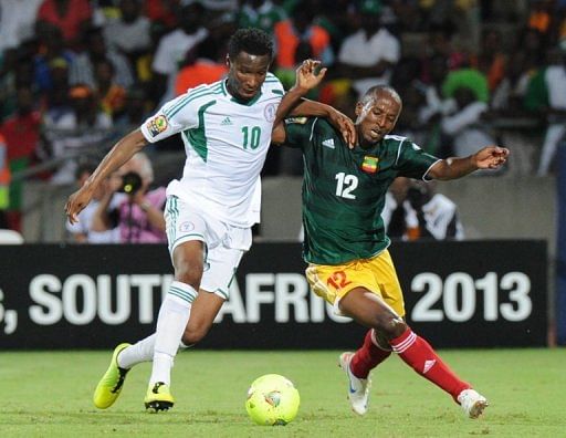 Nigeria&#039;s John Obi Mikel (L) and Ethiopia&#039;s Biyadiglign Eliase during their Africa Cup match on January 29, 2013