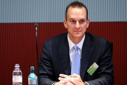 Travis Tygart waits to speak at the Bundestag (lower house of parliament) in Berlin on January 30, 2013