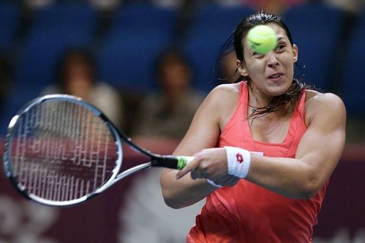 France&#039;s Marion Bartoli returns the ball to USA&#039;s Christina Mchale on January 30, 2013 in Paris