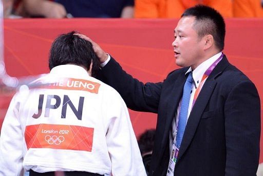 Japanese women&#039;s judo coach Ryuji Sonoda (right) at the London 2012 Olympic Games, July 31, 2012.