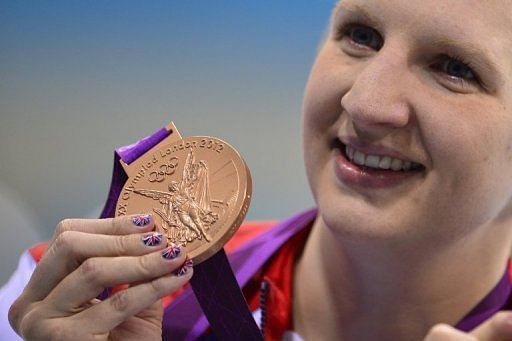 Britain&#039;s Rebecca Adlington on the podium with her bronze in the 800m freestyle at the London Olympics on August 3, 2012