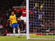 MANCHESTER, ENGLAND - JANUARY 30: Artur Boruc of Southampton makes a save from Robin van Persie of Manchester United