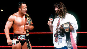 Rock congratulates Mick Foley