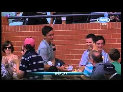 Video: Cricket spectator's amazing one-handed catch whilst holding food in other hand
