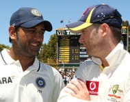 Indian captain MS Dhoni (L) and Australi
