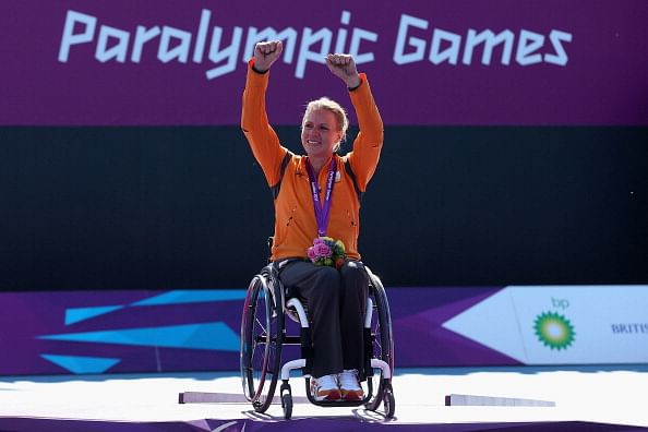 LONDON, ENGLAND - SEPTEMBER 07:  Esther Vergeer of Netherlands with her gold medal after defeating Aniek Van Koot of Netherlands in the final of the Women&#039;s singles match in the Wheelchair Tennis on day 9 of the London 2012 Paralympic Games at Eton Manor on September 7, 2012 in London, England.  