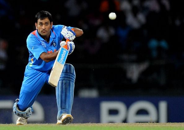 Dhoni dazzles to take India beyond 300